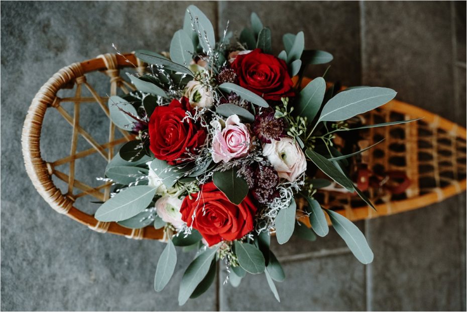 A winter bouquet on a vintage snowshoe. Photos by Wild Connections Photography
