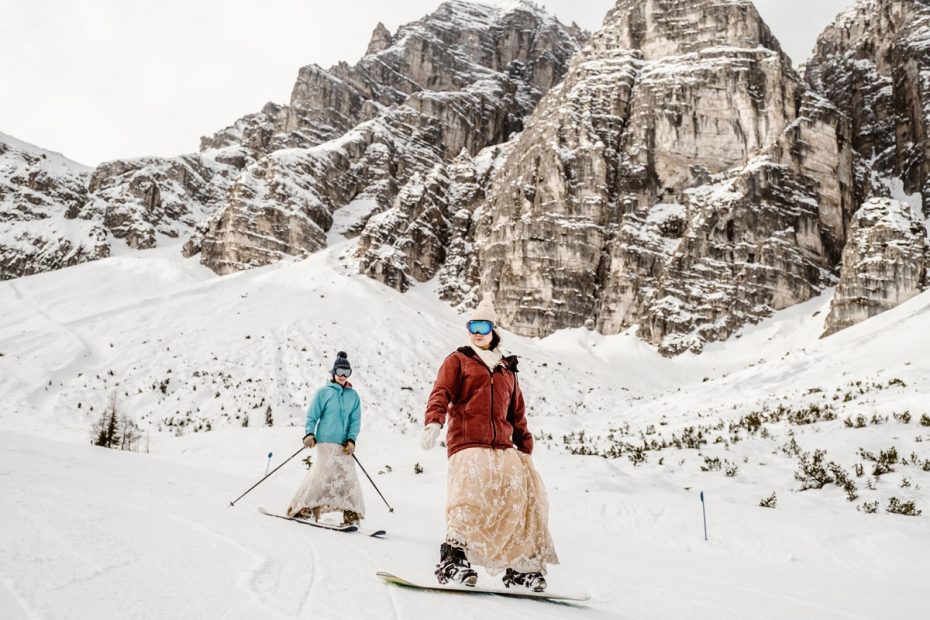 A skiing and snowboarding bride in the Alps by Wild Connections Photography