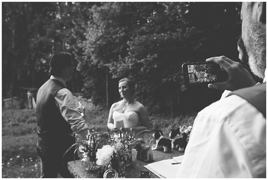 St Johann in Tirol Elopement best man Dave films the vows on his phone by Wild Connections Photography