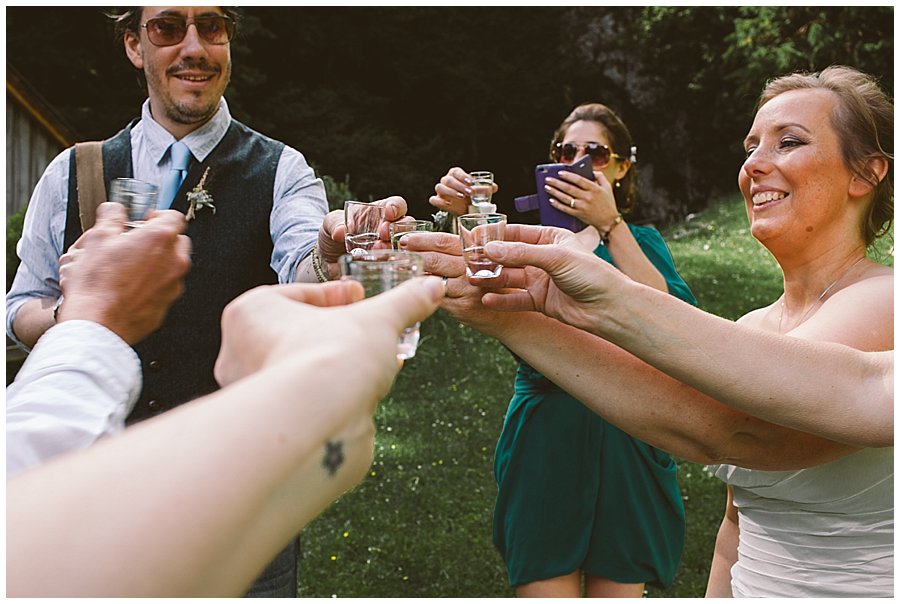 St Johann in Tirol Elopement the group toasts with a celebratory schnapps by Wild Connections Photography