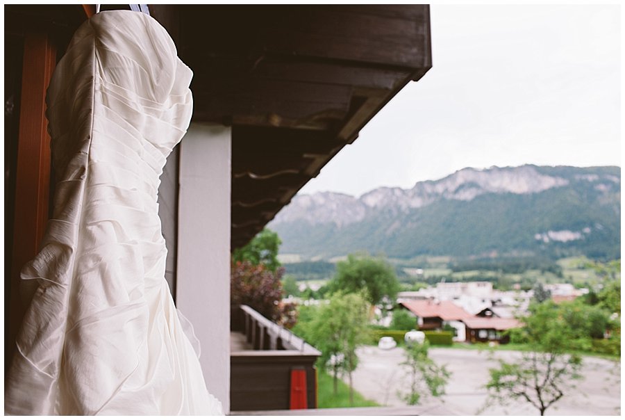 St Johann in Tirol Elopement Nikki's dress hangs on the balcony by Wild Connections Photography