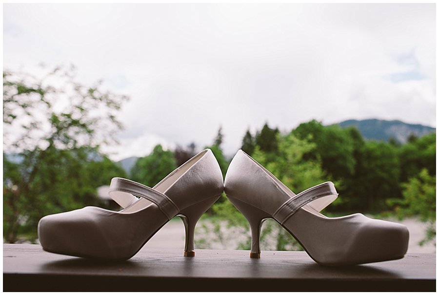 St Johann in Tirol Elopement Nikki's shoes sit on the balcony by Wild Connections Photography