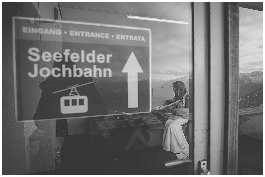 The bride waits in a room by the ski lift before the ceremony