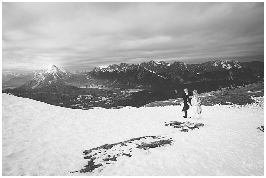 Seefeld Wedding The father of the bride walks his daughter Steph up the ski slope to her ceremony by Wild Connections Photography