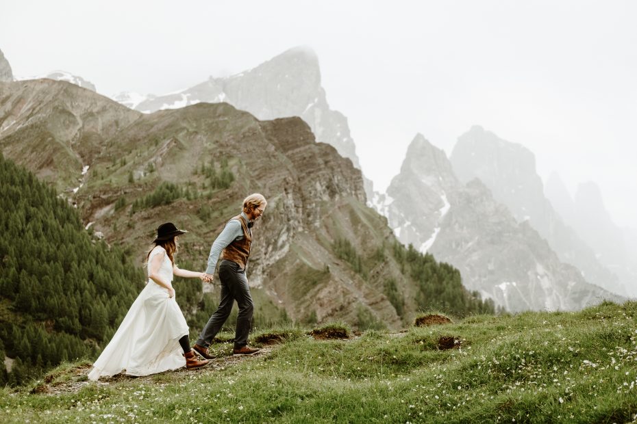 Bride & groom hiking in the Dolomites by Wild Connections Photography