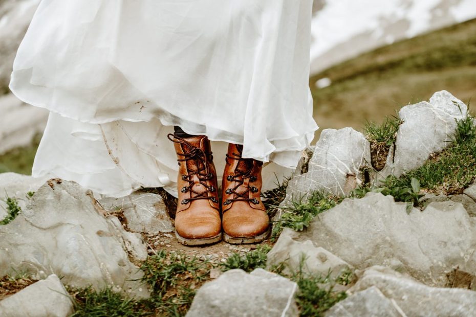 Bride wearing hiking boots in the Dolomites