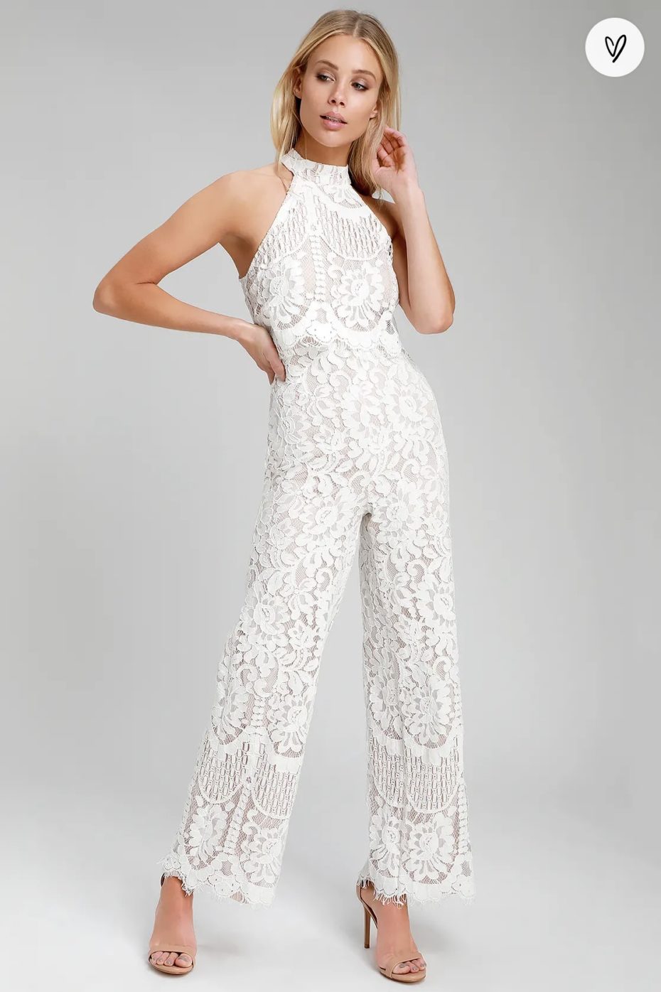 Bride wearing white lace jumpsuit from Lulus